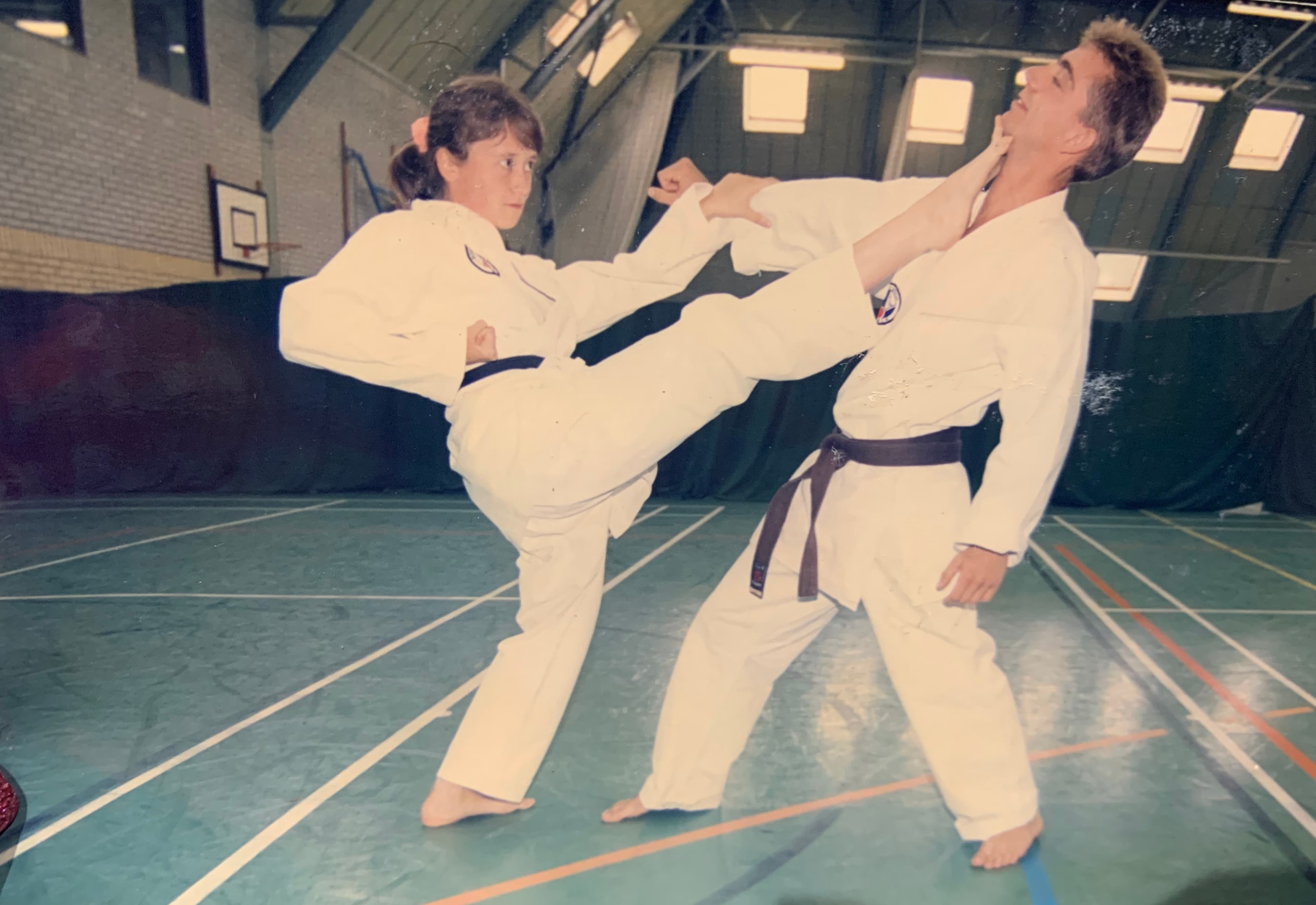 Karate students practising a kick together